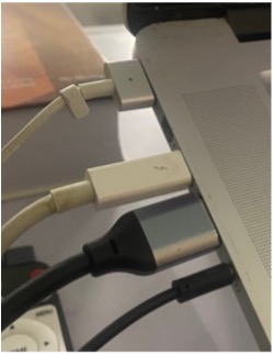 Left side cables plugged into Macbook